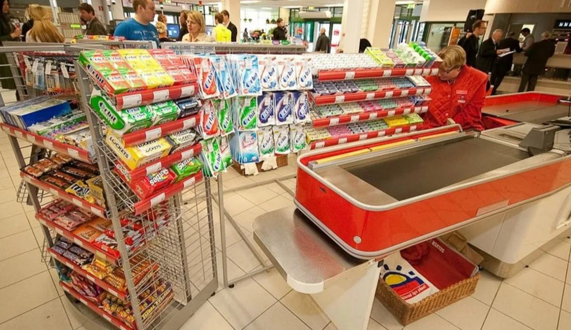 pos материалы в прикассовой зоне - фото